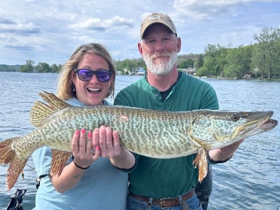 finger lakes fishing in new york mike crawford holding fish with client