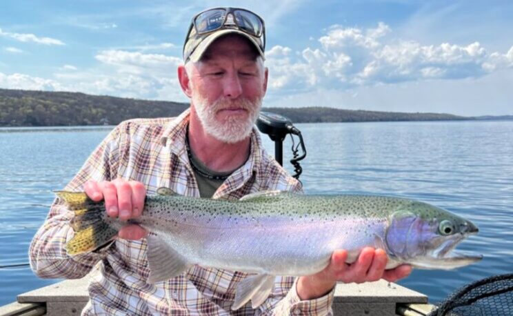 skaneateles lake fishing ny mike crawford holding fish